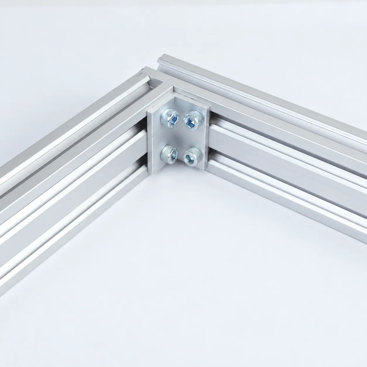 BAB-24 — L Bracket 20x40mm สีเงิน